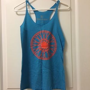 Blue Soulcycle racerback tank top w/ orange wheel